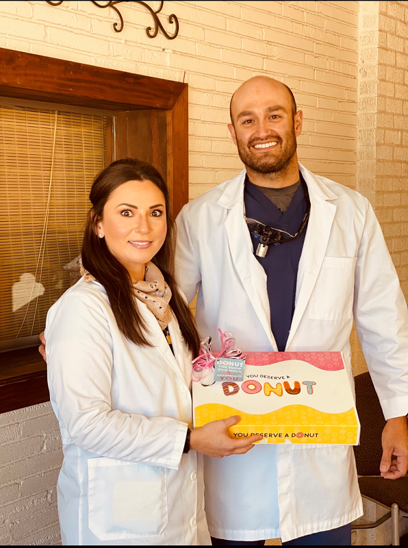 A photo of doctor ramiro garcia and a staff member