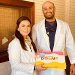 A photo of doctor ramiro garcia and a staff member